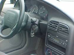 wrecked_2001_Saturn_SL2_grey_dash.JPG