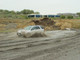 10699Amy_MattDrivingThroughMud_07.JPG
