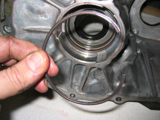 Differential retainer ring removal (inside case)