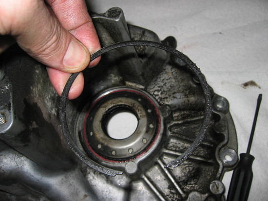 Axle seal retainer ring, removed